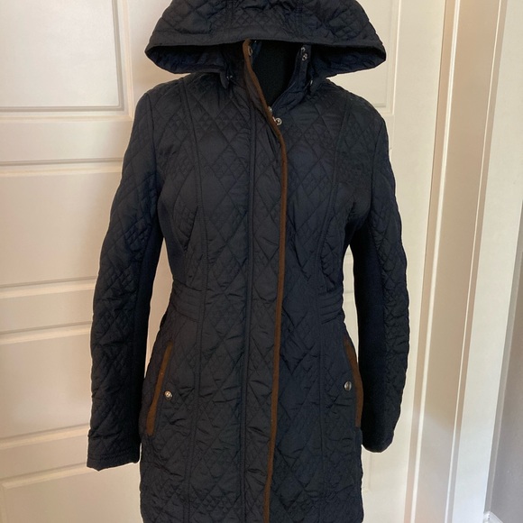 weatherproof women's jacket with detachable hood